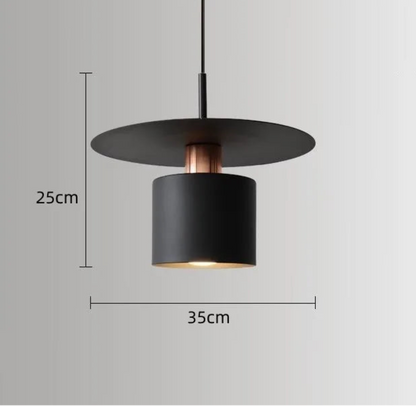 Aero Slim cylinder pendant light in matte black with wide flat disc shade and copper accent collar showing dimensions 25cm height by 35cm diameter on a neutral grey background — LivDecor
