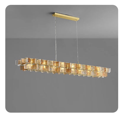 Amber and clear ribbed glass iron linear chandelier 125cm wide with gold rectangular ceiling mount and adjustable hanging cord displayed against a neutral grey background — LivDecor
