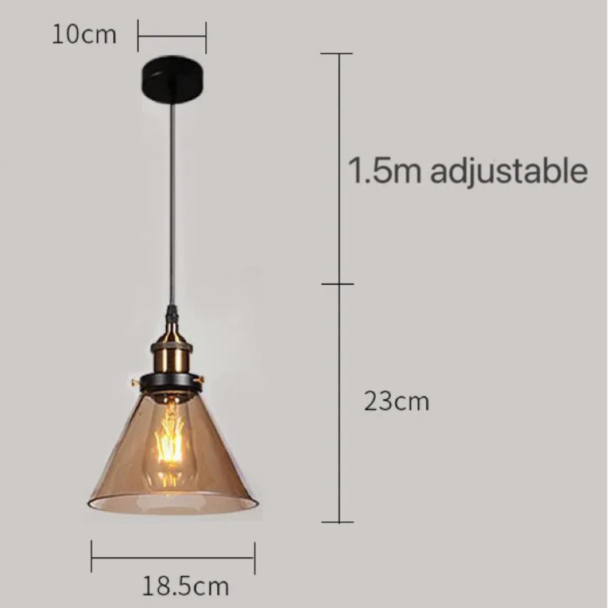 Amber glass cone-shaped pendant light with brass Edison bulb fitting and black cord, showing dimensions of 18.5cm width and 23cm drop with 1.5m adjustable cord on a grey background — LivDecor