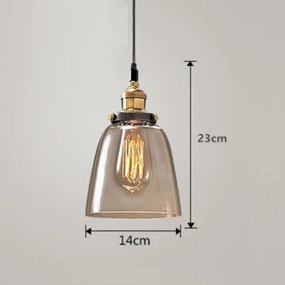 Single amber glass bell pendant light with antique brass socket and Edison filament bulb on black cord, 14cm diameter and 23cm height — LivDecor