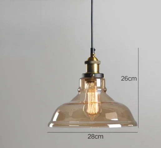 Single amber glass dome pendant light with antique brass socket and Edison filament bulb on black cord, 28cm diameter — LivDecor
