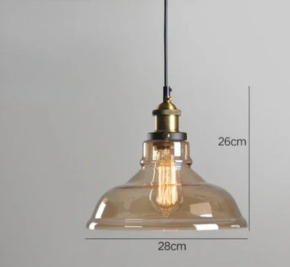 Single amber glass dome pendant light with antique brass socket and Edison filament bulb on black cord, 28cm diameter — LivDecor
