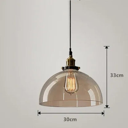 Single amber glass dome pendant light with antique brass socket and Edison filament bulb on black cord, 30cm diameter and 33cm height — LivDecor