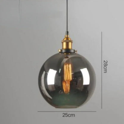 Single smoky gray glass globe pendant light with antique brass socket and Edison filament bulb on black cord, 25cm diameter, 28cm height — LivDecor
