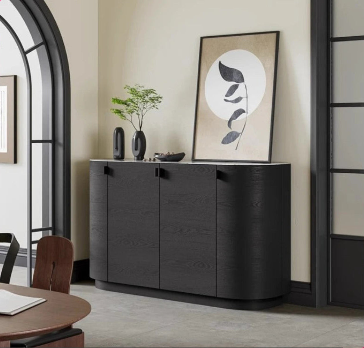 Aura Glass Wabi-Sabi display cabinet in black with marble top styled in a warm neutral dining room with arched doorway and walnut dining table — LivDecor

