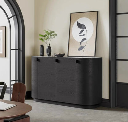 Aura Glass Wabi-Sabi display cabinet in black with marble top styled in a warm neutral dining room with arched doorway and walnut dining table — LivDecor
