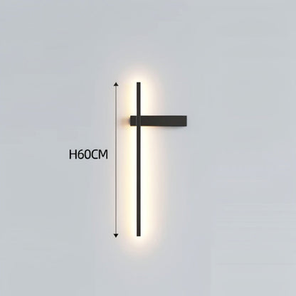 Black minimalist linear LED wall sconce with right-facing mounting arm emitting a warm glow, showing 60cm height on a grey background — LivDecor
