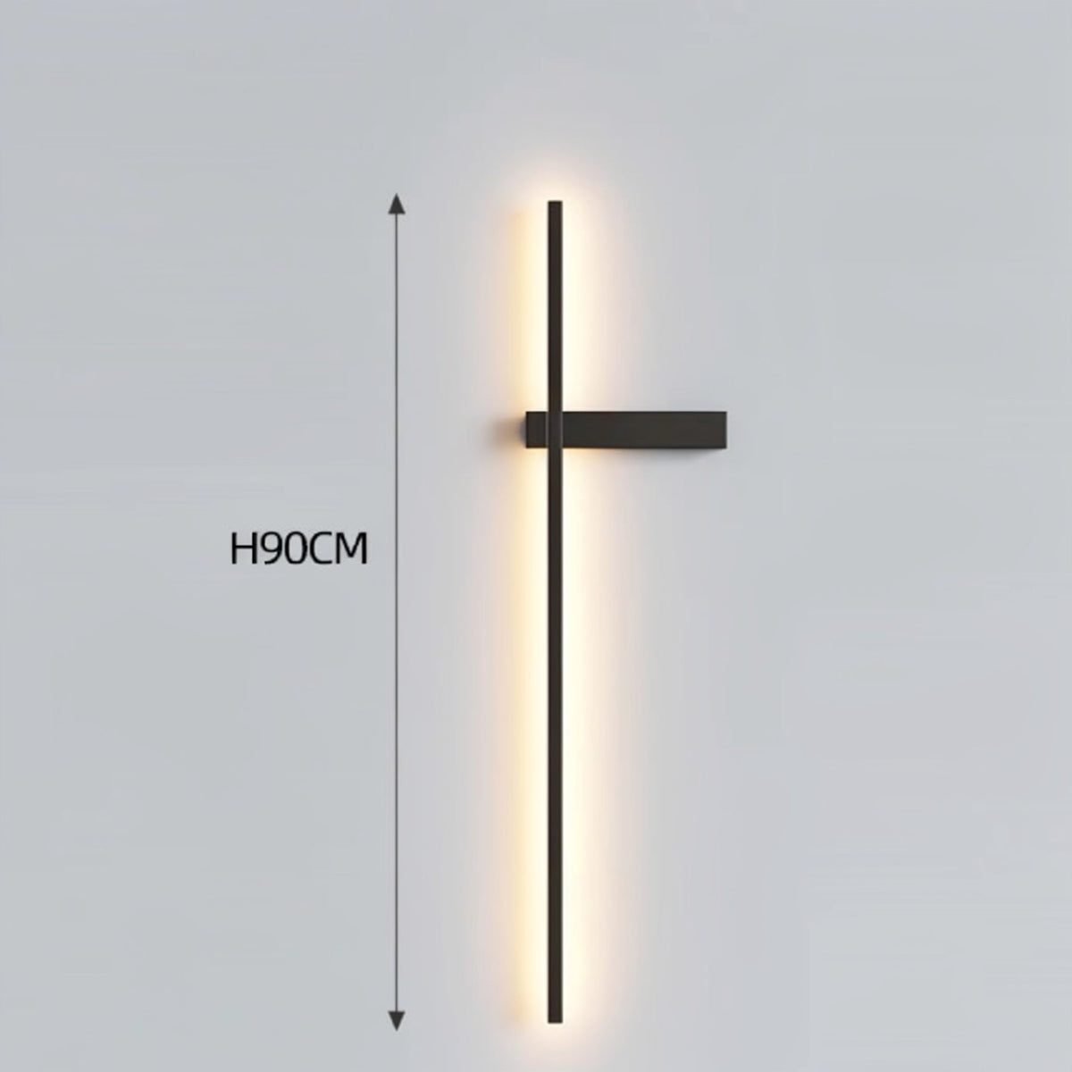 Black minimalist linear LED wall sconce with right-facing mounting arm emitting a warm glow, showing 90cm height on a grey background — LivDecor
