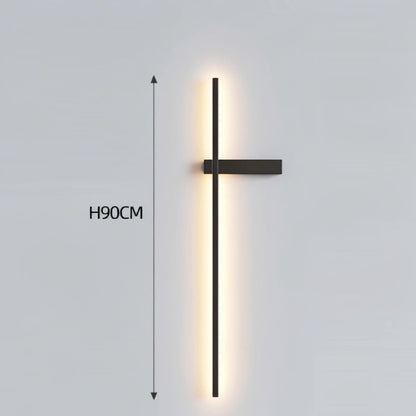 Black minimalist linear LED wall sconce with right-facing mounting arm emitting a warm glow, showing 90cm height on a grey background — LivDecor
