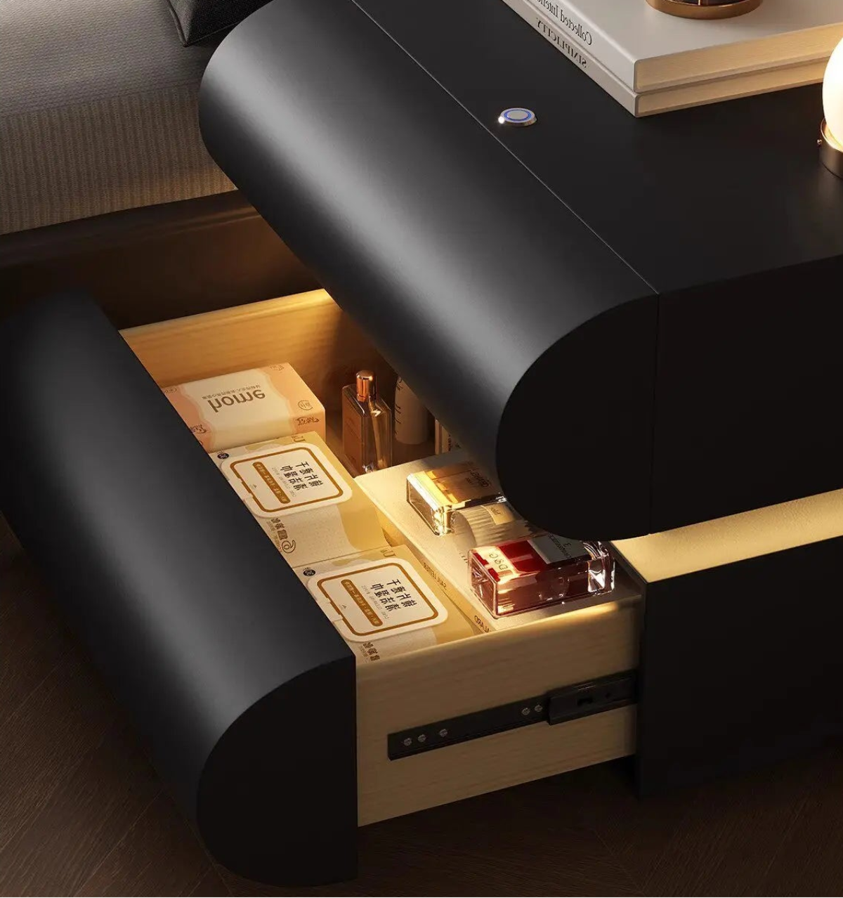 Aura Smart LED luxury nightstand in black with illuminated hidden drawer open revealing warm LED-lit interior storage compartment and touch button on top — LivDecor
