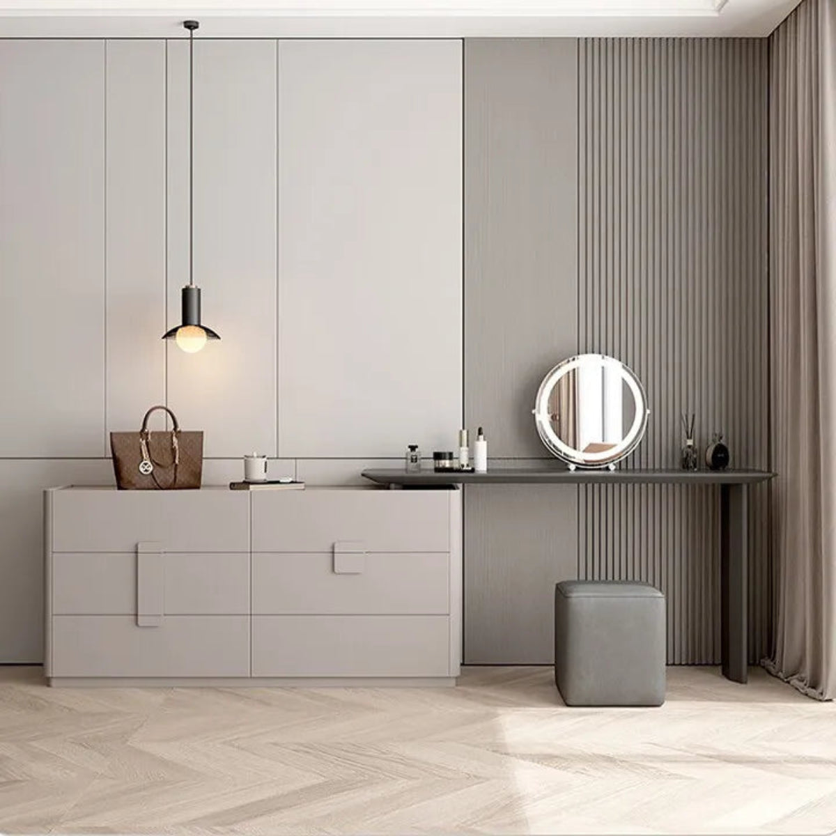 Aura Suite luxury vanity dresser set in light grey wide-crop view with 6-drawer chest, integrated vanity desk, round LED mirror, and cube stool in a minimalist grey bedroom with herringbone floor — LivDecor
