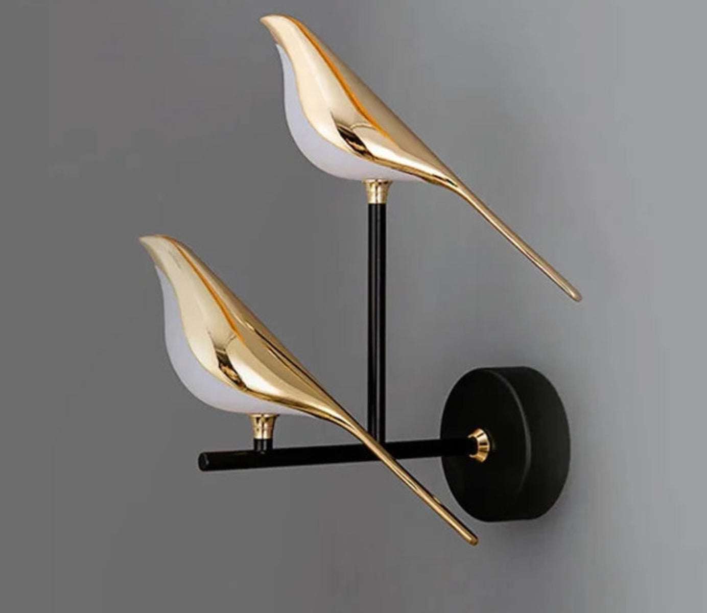 Avis Modern Origami Bird LED wall sconce in gold with frosted white underbelly and matte black arm two-bird configuration on a neutral grey background — LivDecor

