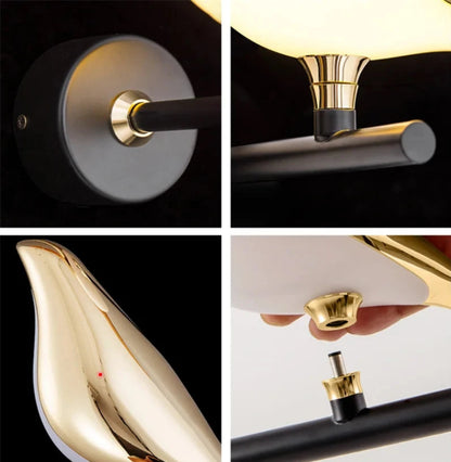 Avis Modern Origami Bird LED wall sconce four-panel construction detail showing matte black wall plate with gold collar, trumpet pivot connector, mirror gold bird body, and screw-fit assembly joint — LivDecor
