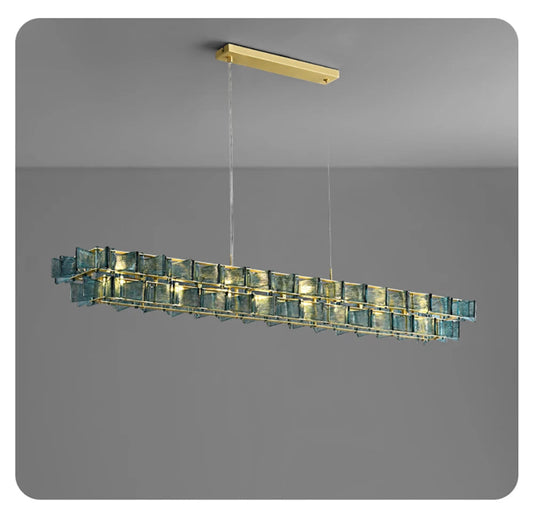 Blue ribbed glass iron linear chandelier 150cm wide with gold rectangular ceiling mount and adjustable hanging cord displayed against a neutral grey background — LivDecor
