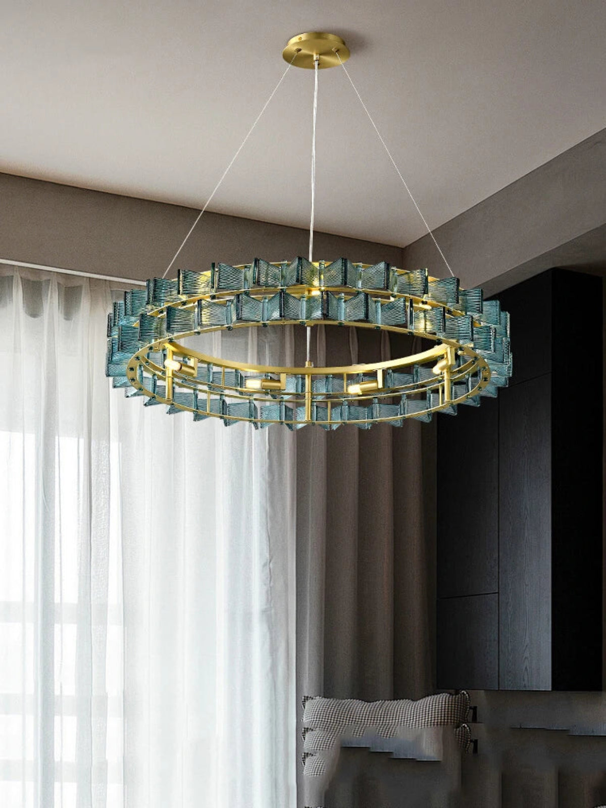 Blue ribbed glass iron round chandelier with gold double-ring frame hanging in a contemporary living room with sheer white curtains and dark accent wall — LivDecor
