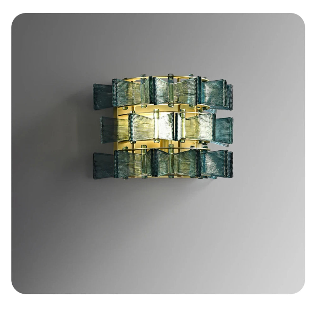 Blue ribbed glass iron wall sconce in medium size with three-tier gold frame and glowing bulb displayed against a neutral grey background — LivDecor