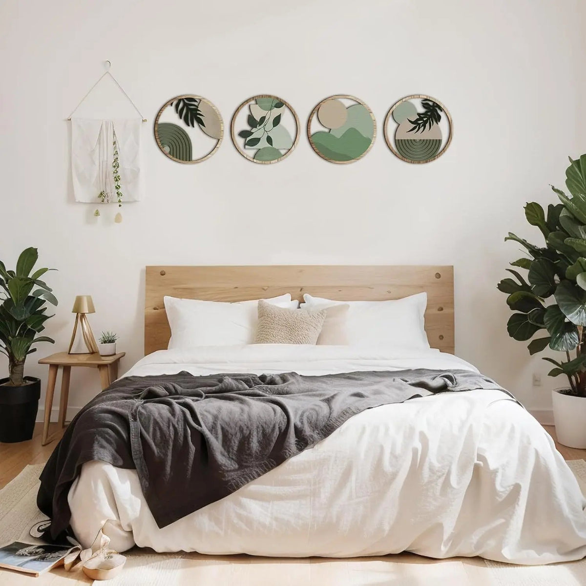 4-piece boho mid-century modern round wooden wall art set displayed in a row above a natural wood headboard in a bright boho bedroom with fiddle leaf fig plants and macramé wall hanging — LivDecor