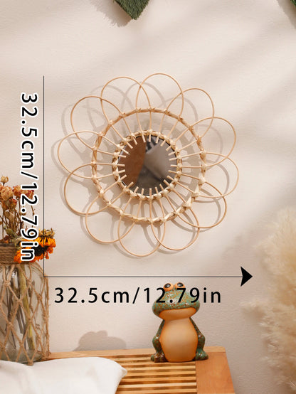 Dimension chart for boho rattan sunflower wall mirror showing 32.5cm/12.79in diameter, displayed on a cream wall with dried florals and pampas grass — LivDecor