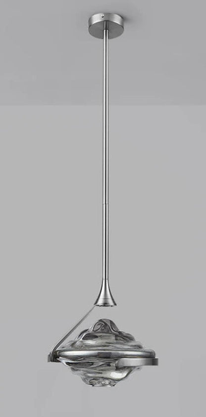 Single charcoal wave glass geometric pendant light on a chrome stem with round ceiling canopy against a grey background — LivDecor