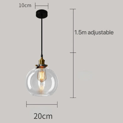 Clear glass globe pendant light with brass Edison bulb fitting and black cord, showing 20cm diameter with 1.5m adjustable cord on a grey background — LivDecor