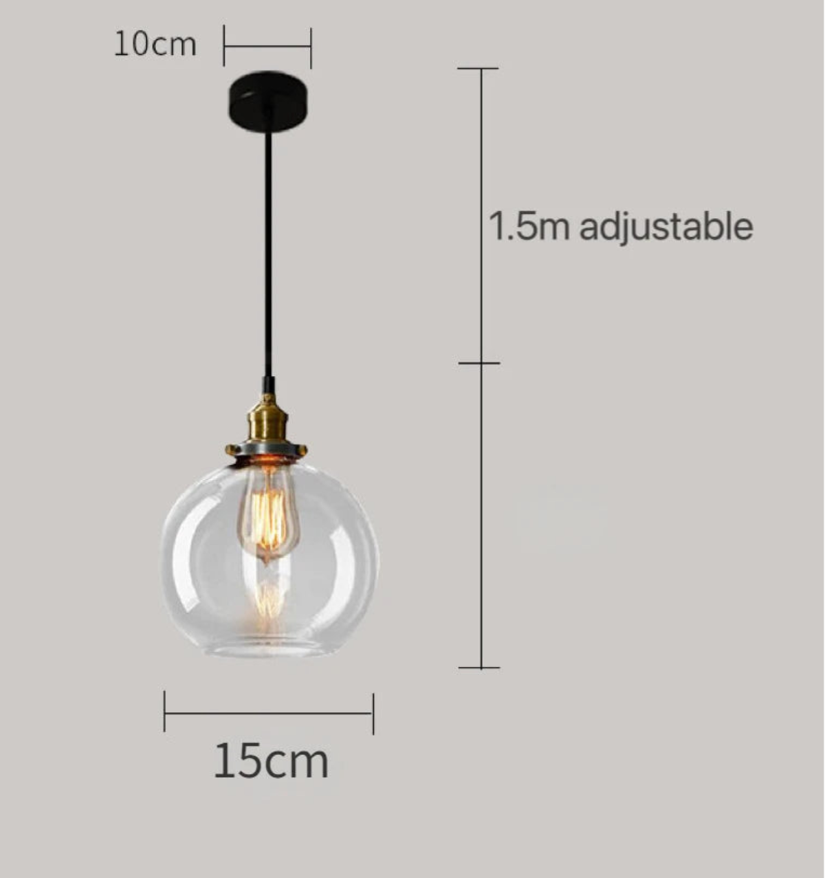 Clear glass globe pendant light with brass Edison bulb fitting and black cord, showing 15cm diameter with 1.5m adjustable cord on a grey background — LivDecor