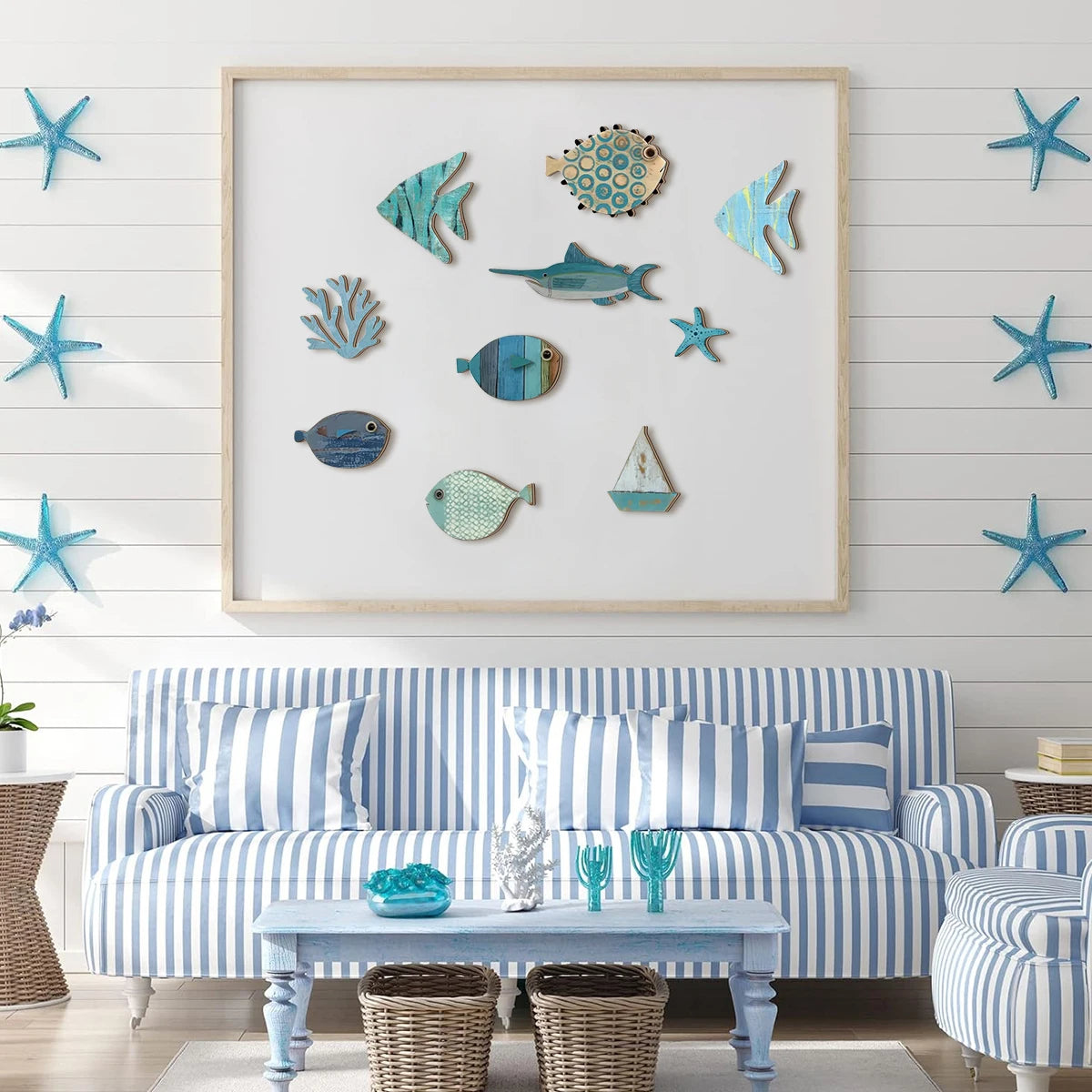 10-piece coastal wooden wall art set displayed in a large frame above a blue and white striped sofa in a bright beach-inspired living room — LivDecor