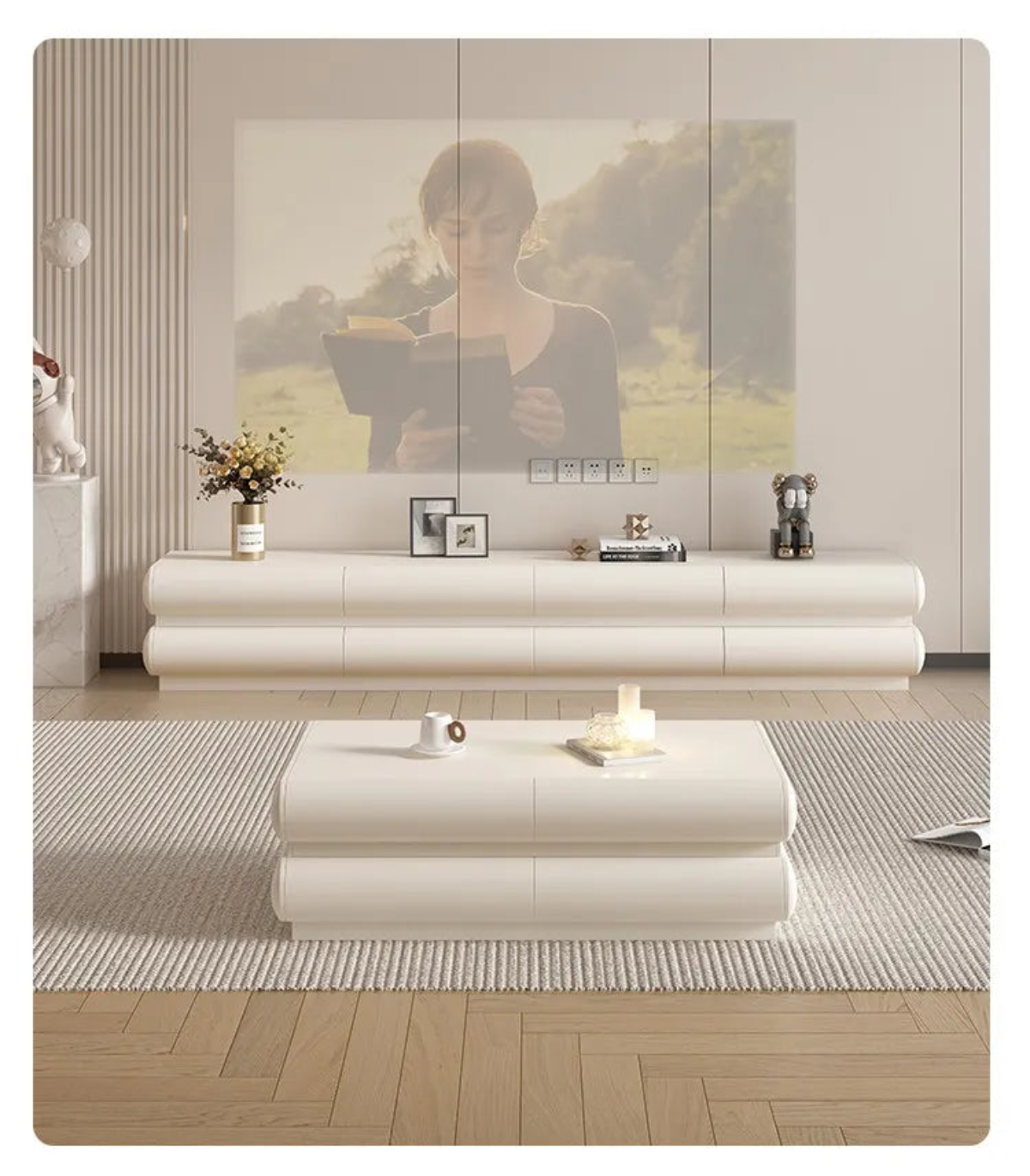 Cream ivory tubular floating TV stand centered in a modern living room with a matching coffee table, dried florals, framed art, and projector screen lifestyle shot — LivDecor
