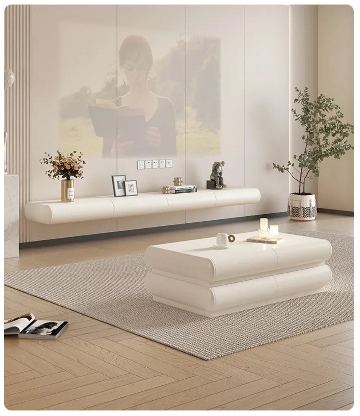 Cream ivory tubular floating TV stand in a wide modern living room styled with a matching coffee table, dried florals, framed art, olive tree, and projector screen lifestyle shot — LivDecor
