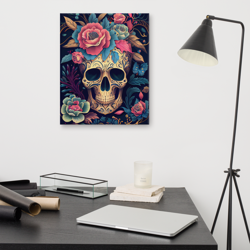 Flor de Noche sugar skull canvas print in 16×20 hung above a dark wood home office desk with a laptop, glass tray, stacked books, candle, and black tripod floor lamp — LivDecor
