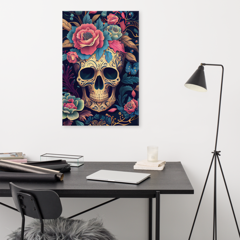 Flor de Noche sugar skull canvas print in 24×36 hung large above a dark wood desk with a laptop, glass tray, stacked books, candle, and black tripod floor lamp beside a sheepskin chair — LivDecor
