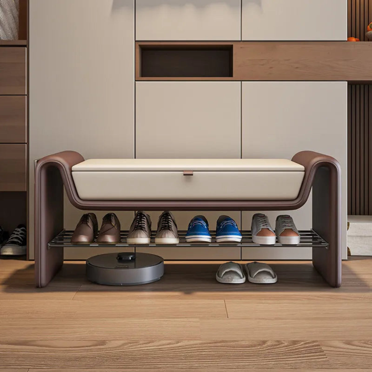 Folio Luxe entryway shoe storage bench in brown faux leather with cream lift-top seat shown straight-on with shoes organized on the lower rack in a modern entryway — LivDecor
