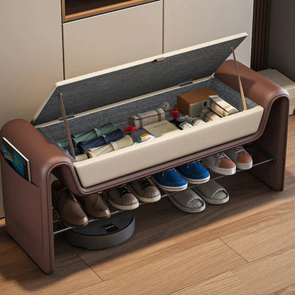 Folio Luxe entryway shoe storage bench in brown faux leather with lift-top lid open revealing spacious hidden storage compartment above lower shoe rack — LivDecor
