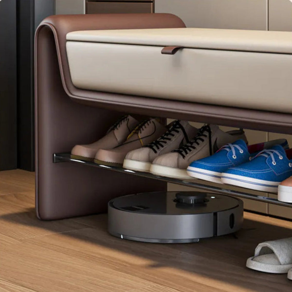 Close-up of the Folio Luxe entryway shoe storage bench lower shoe rack in brown faux leather showing organized shoe storage on wood flooring — LivDecor
