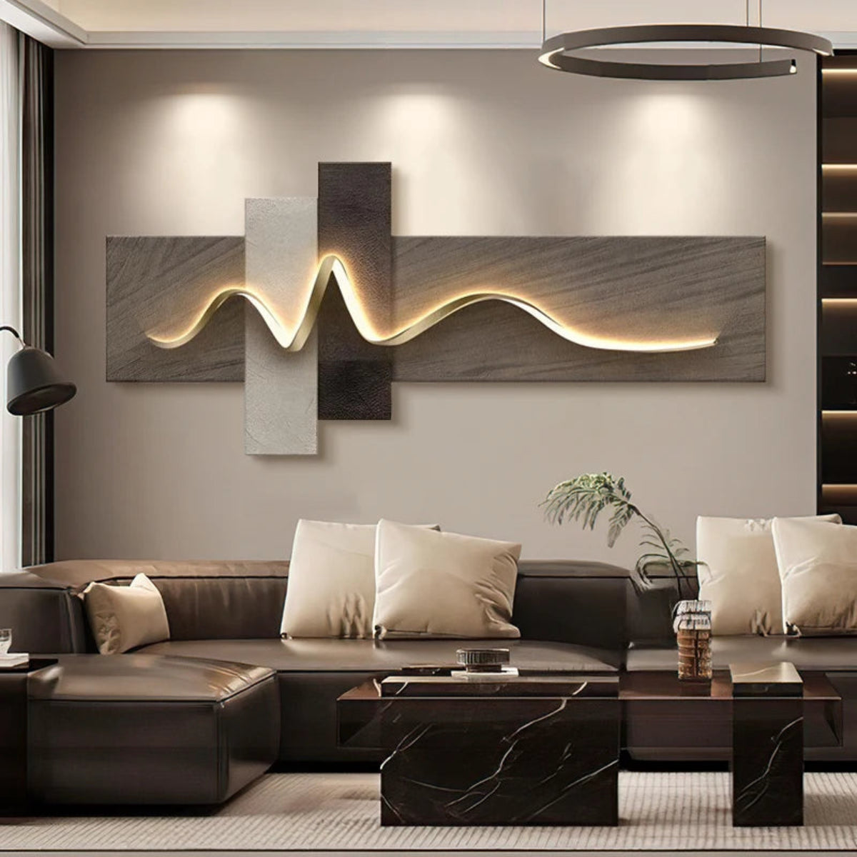 Geometric Wave LED wall art with grey wood-grain and white plaster cross-panel canvas and warm amber LED light strip illuminated above a dark chocolate leather sectional sofa with dark marble coffee tables and black ring pendant — LivDecor
