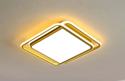 Halo modern tricolor LED flush mount ceiling light in golden square frame glowing warm amber on a white ceiling — LivDecor
