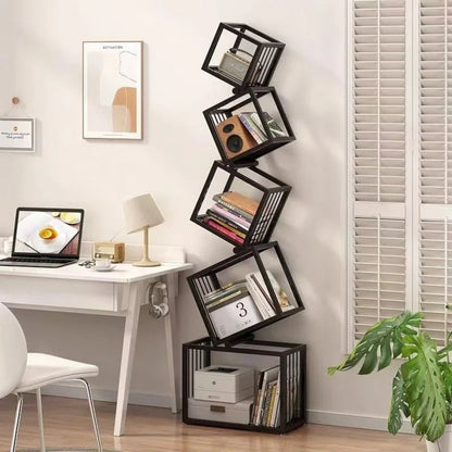 Helix Loft 5-tier industrial iron bookcase in black styled with books and a vintage speaker in a warm white home office with monstera plant — LivDecor
