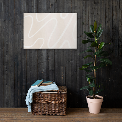 Ivory Flow abstract canvas print in 24×36 hung large on a dark charcoal wood plank wall above a wicker basket with a light blue knit throw and rubber tree plant — LivDecor
