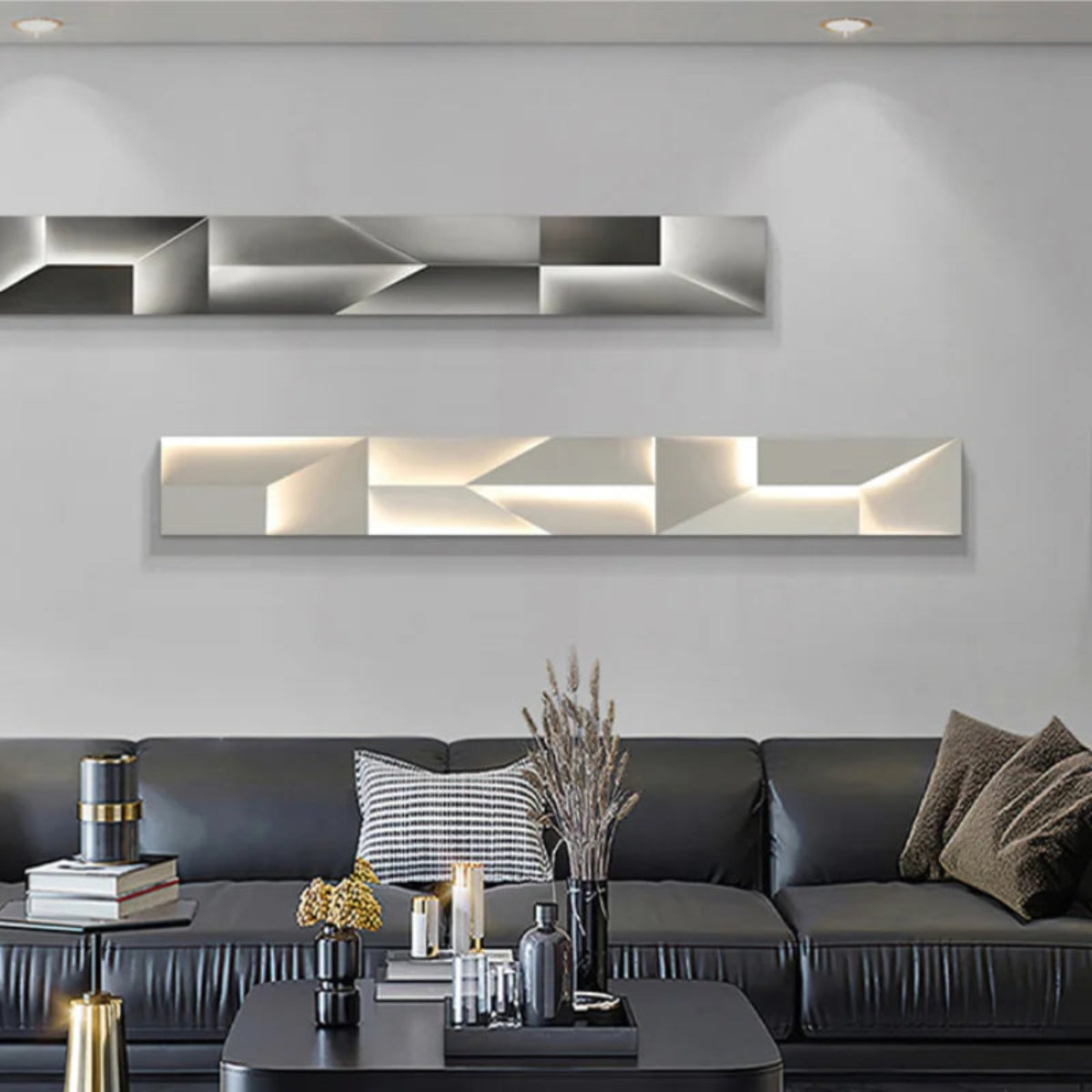 Luminary Canvas backlit crystal art wall sconce in horizontal configuration shown in grey and white warm LED tones mounted above a dark leather sofa in a modern living room — LivDecor

