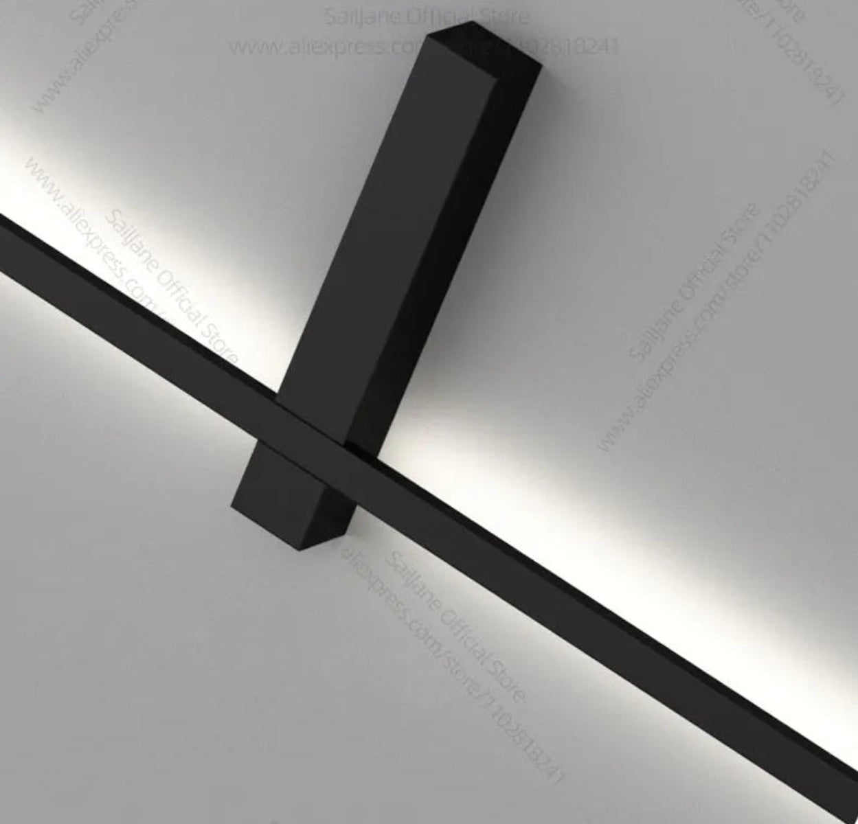 Close-up detail of minimalist linear LED wall sconce matte black arm and bracket hardware against a white background — LivDecor
