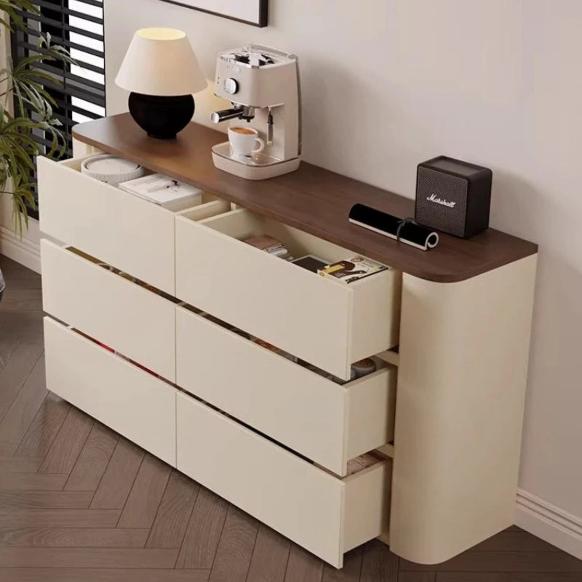 Nordic Elegance cream ivory buffet credenza with walnut top shown from above with all 6 drawers open and filled with linens, books, and accessories demonstrating real storage capacity lifestyle shot — LivDecor
