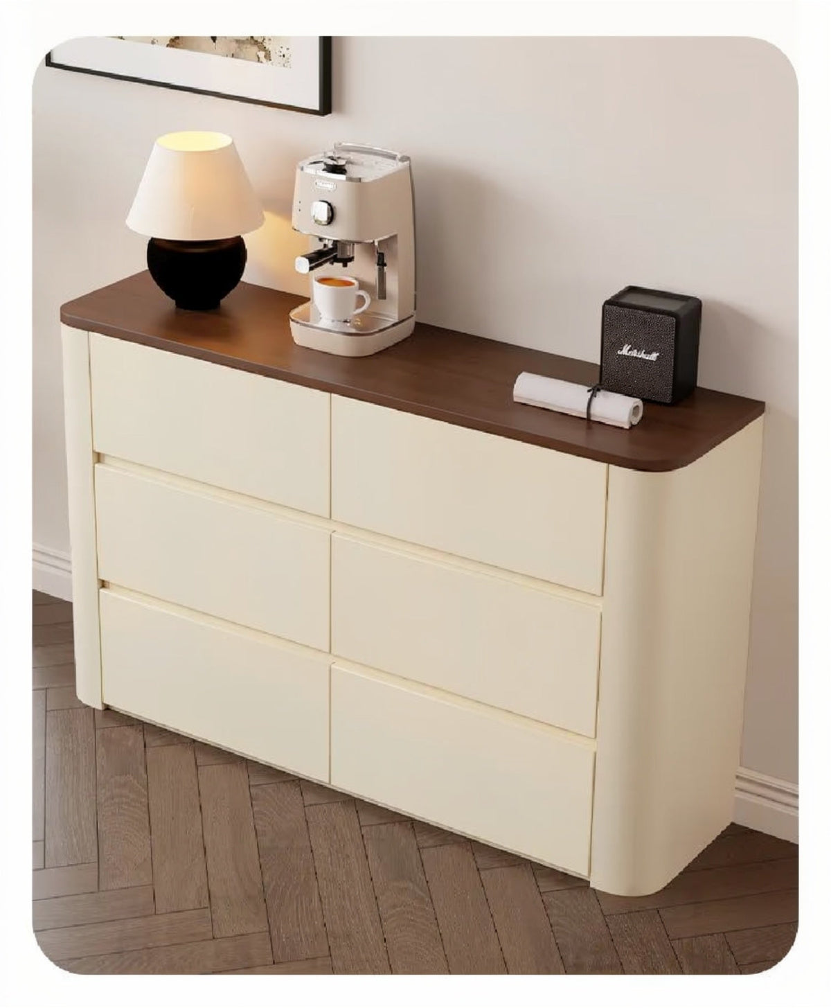 Nordic Elegance cream six-drawer credenza with walnut top and rounded end styled on a herringbone floor with a lamp, espresso machine and Marshall speaker — LivDecor

