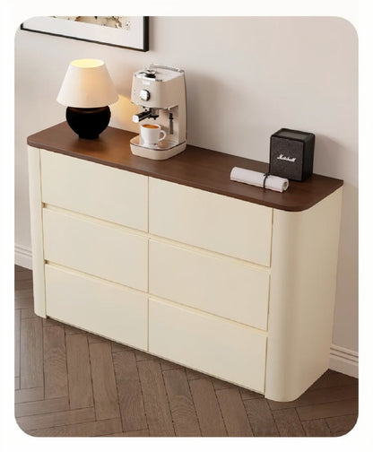 Nordic Elegance cream six-drawer credenza with walnut top and rounded end styled on a herringbone floor with a lamp, espresso machine and Marshall speaker — LivDecor
