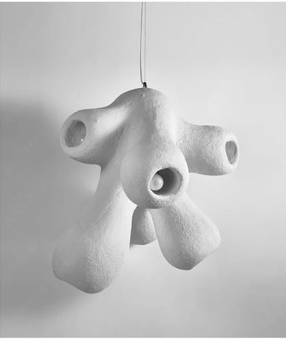 Odense Cocoon sculptural cloud pendant chandelier in white with 4-head organic cluster shown unlit in black and white with dramatic shadow play on a neutral grey background — LivDecor
