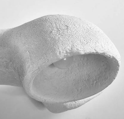 Odense Cocoon sculptural cloud pendant chandelier close-up of unlit cavity interior showing rough textured bowl shape and artisanal plaster-like white finish — LivDecor
