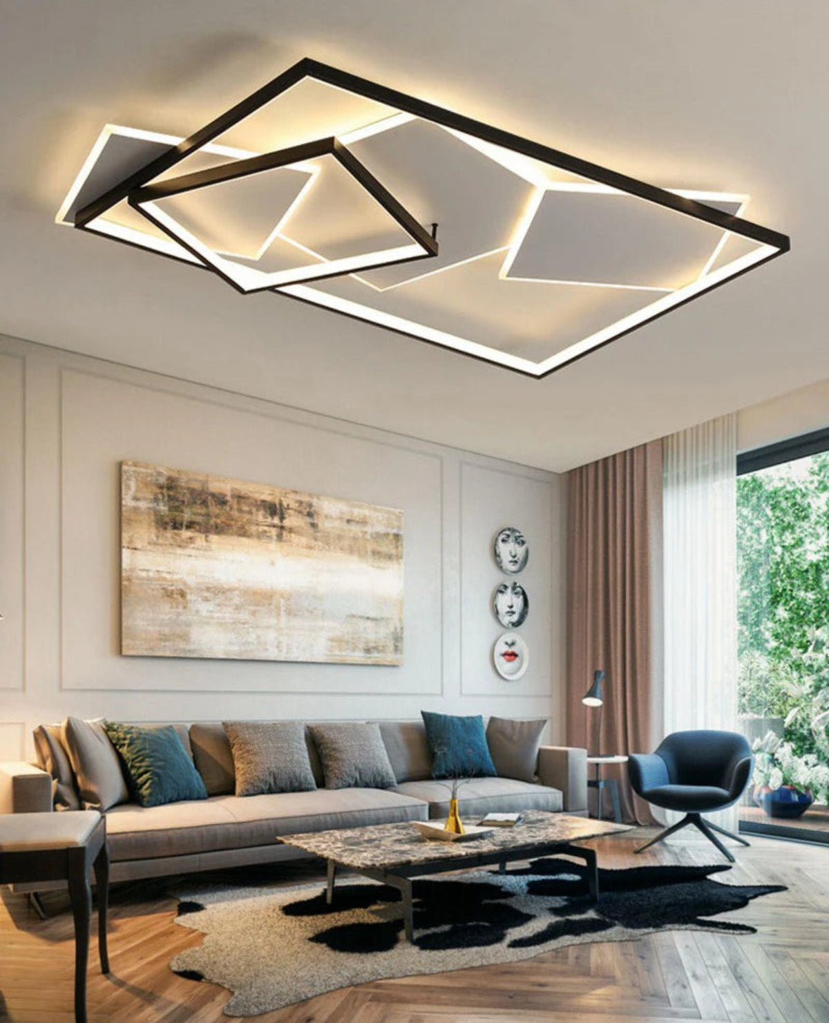 Strata Linear geometric LED chandelier in matte black glowing warm amber in a luxury neutral living room with paneled walls, abstract art, Fornasetti plates, cowhide rug, and blue armchair — LivDecor
