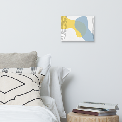 Sun & Shore abstract canvas print in 11×14 hung on a white bedroom wall beside a wood stump nightstand with stacked books and neutral linen bedding — LivDecor

