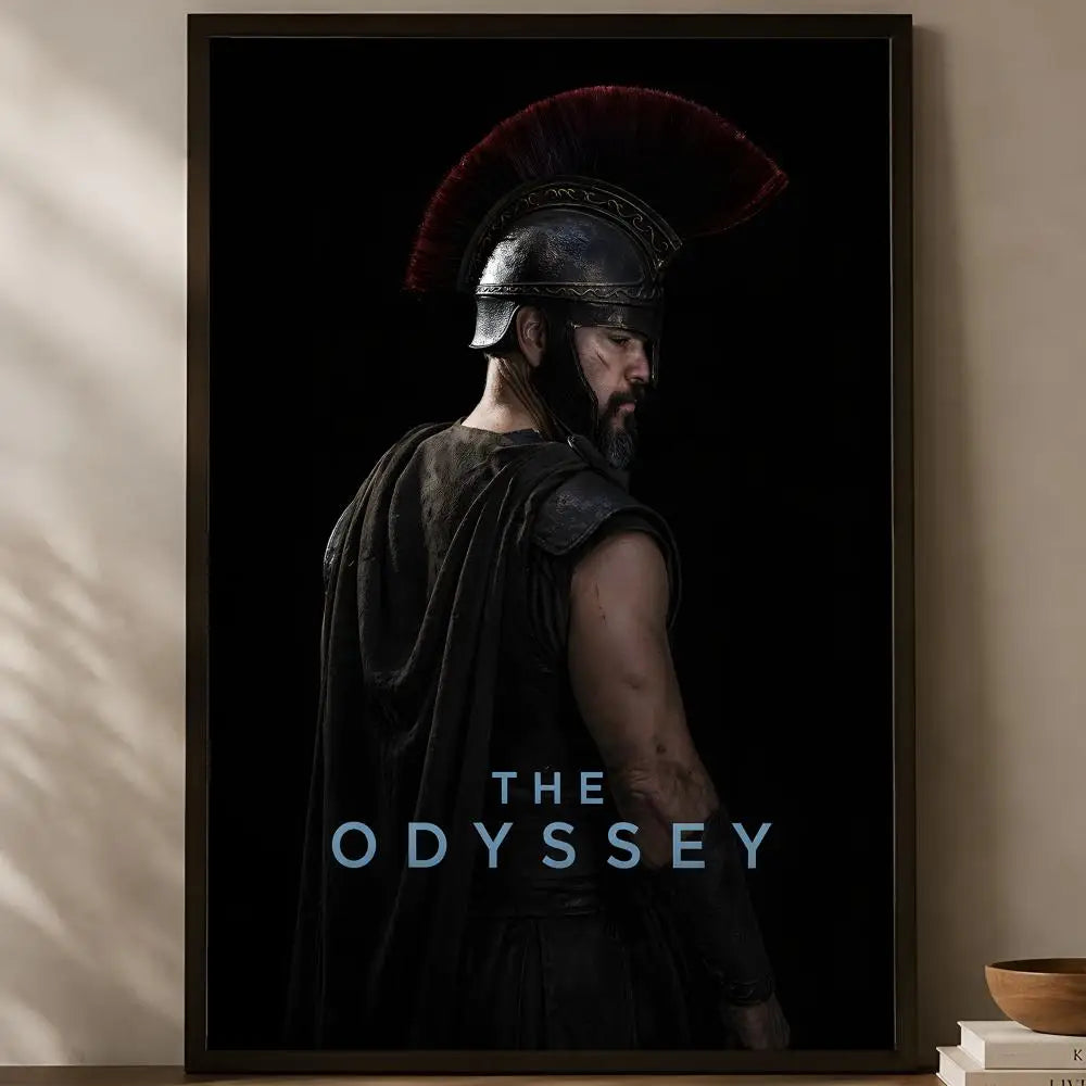 The Odyssey Christopher Nolan cinematic dark portrait brooding warrior in red-plumed helmet head bowed pure black background poster displayed on a warm natural light shelf — LivDecor
