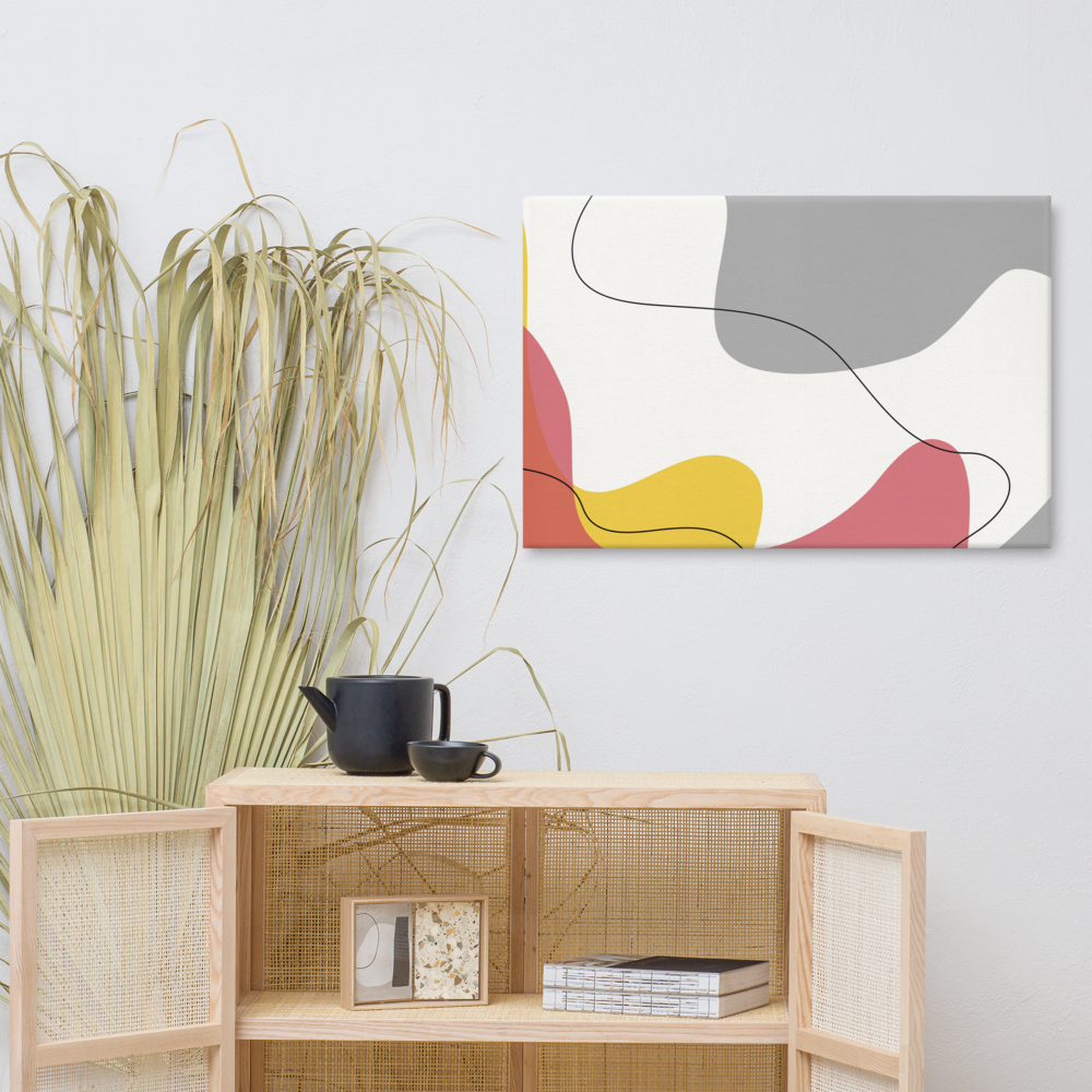 Warm Tide abstract canvas print in 24×36 hung above a rattan cane cabinet styled with a black ceramic tea set and dried pampas grass in a warm boho living space — LivDecor
